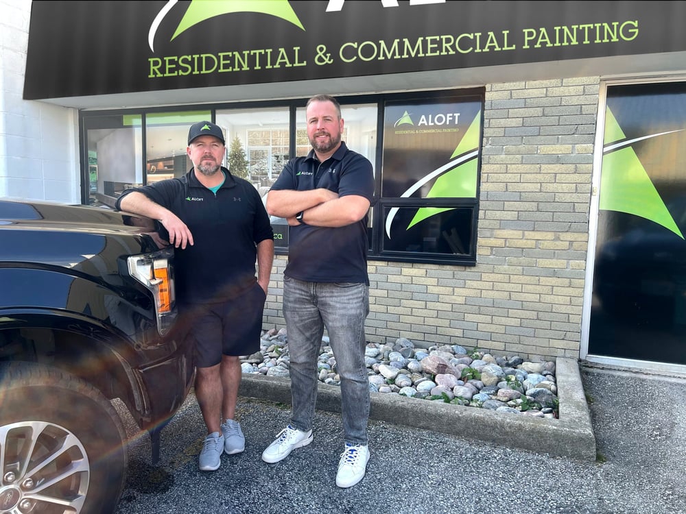 Jeff and Joel, co-owners of Aloft Group Painting, standing by work truck in front of Aloft Group office Jeff and Joel, co-owners of Aloft Group Painting, standing by work truck in front of Aloft Group office